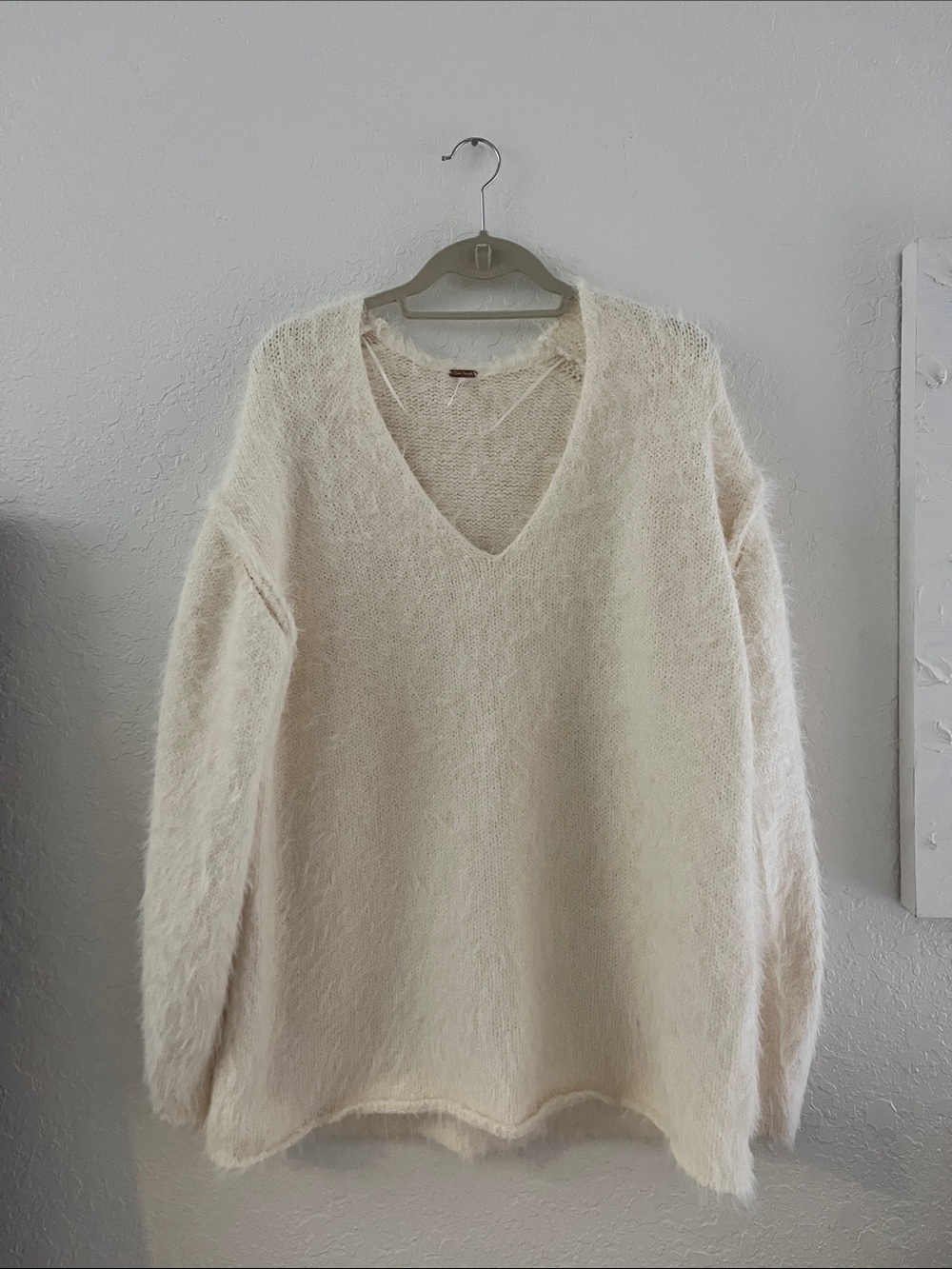 Cozy Cream V-Neck Women's Sweater